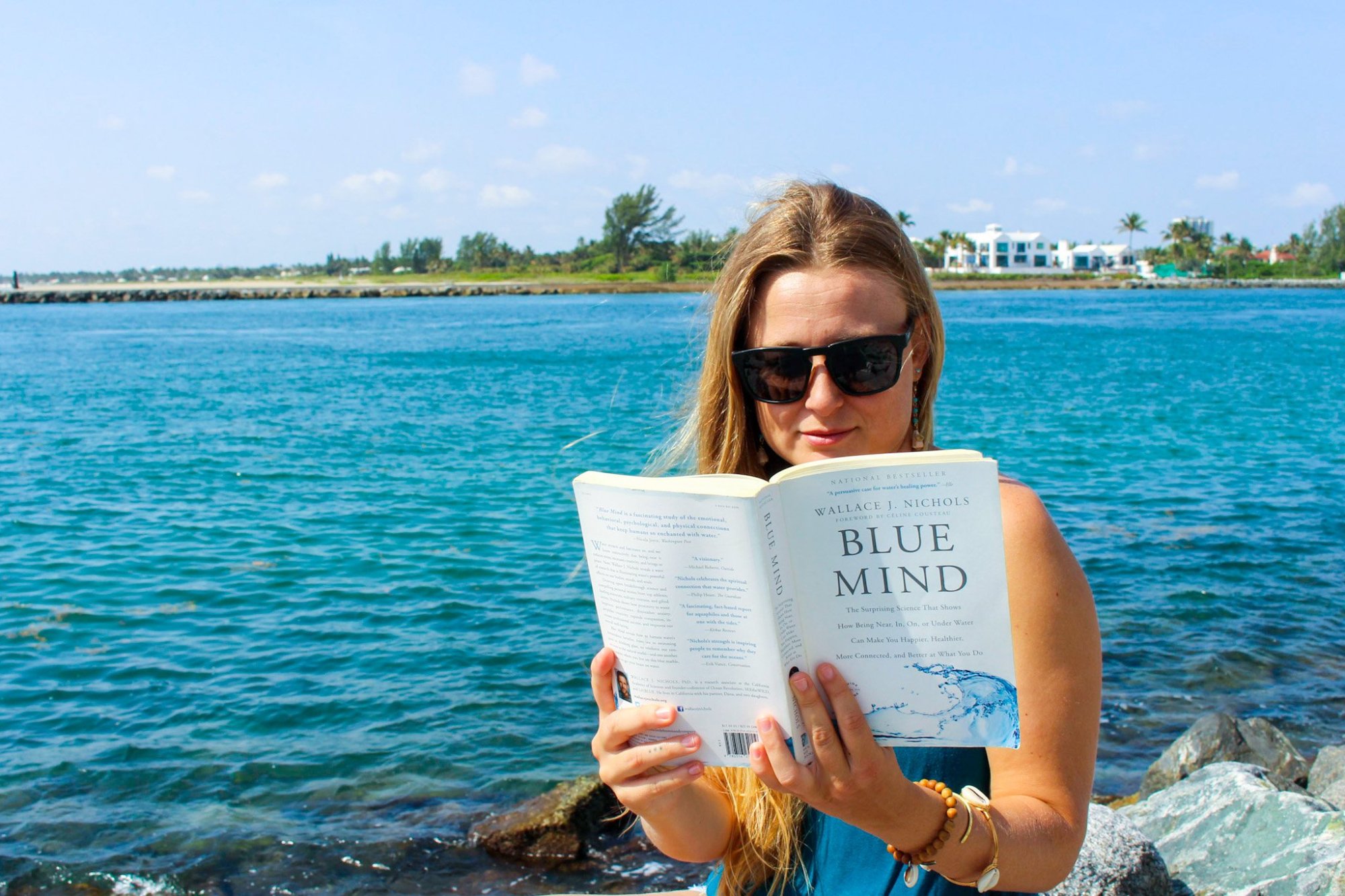 Freediving Books a person drinking out of a body of water