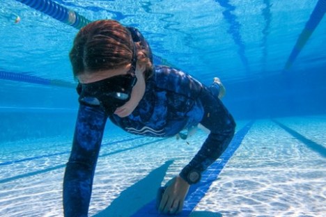 a man in a pool of water