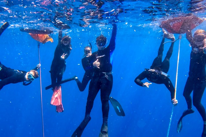 a group of people in the water