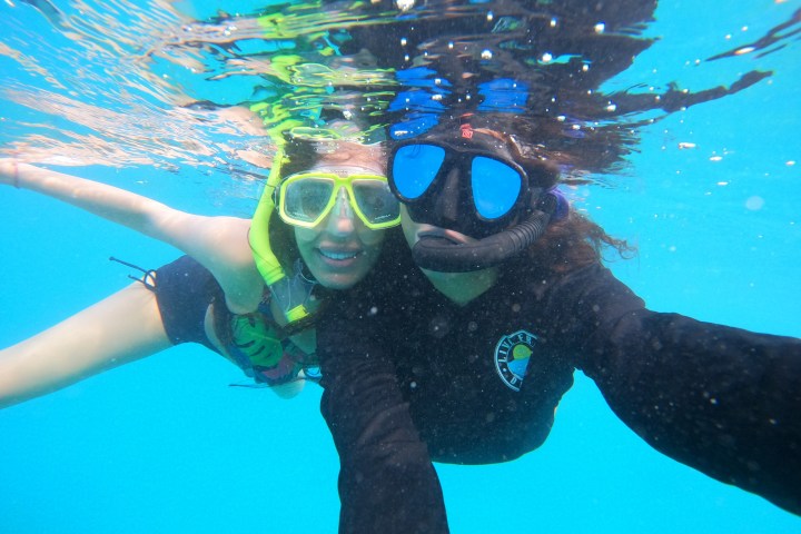 a person swimming in a pool of water