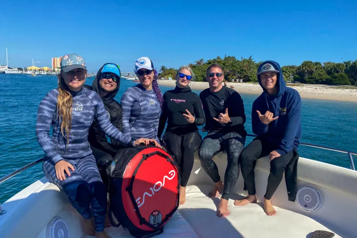 a group of people posing for the camera