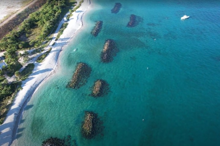 a pool next to a body of water