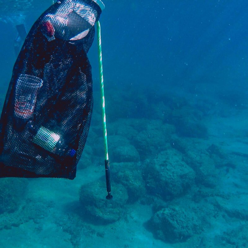 a person that is standing in the water