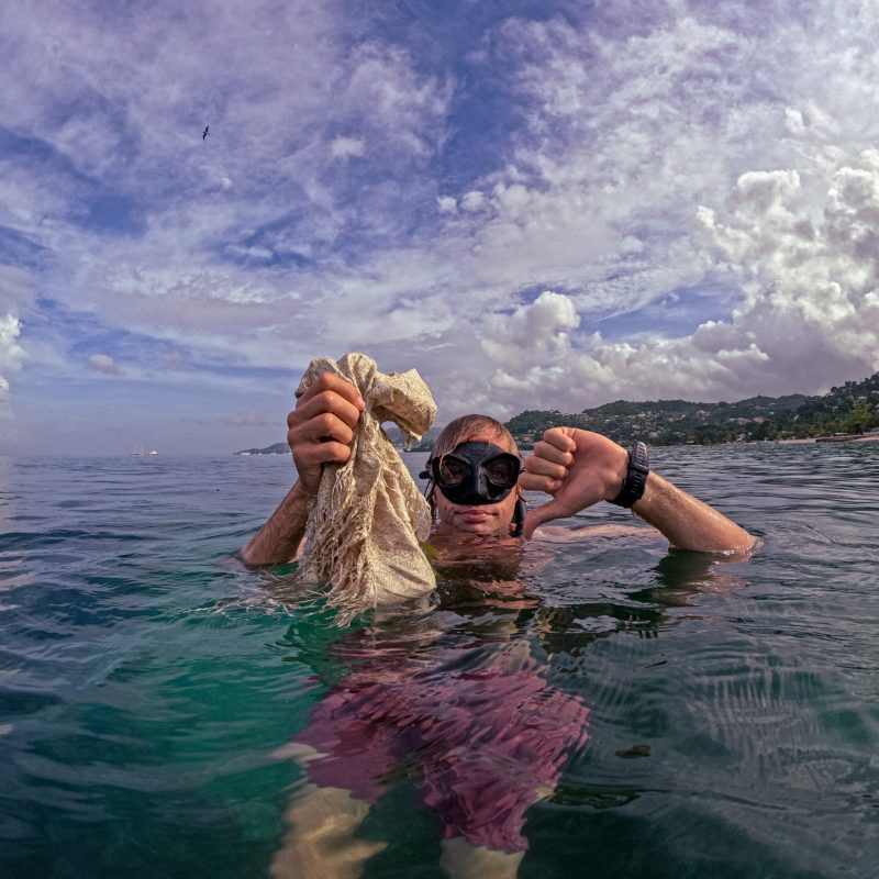 a man and woman swimming in the water