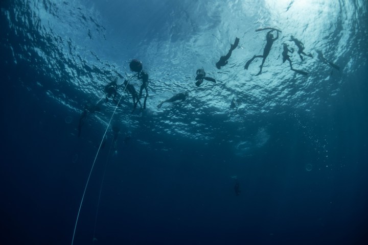 a man swimming in the water