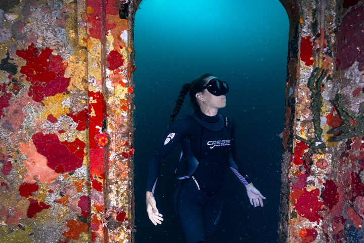 a man standing in front of a door