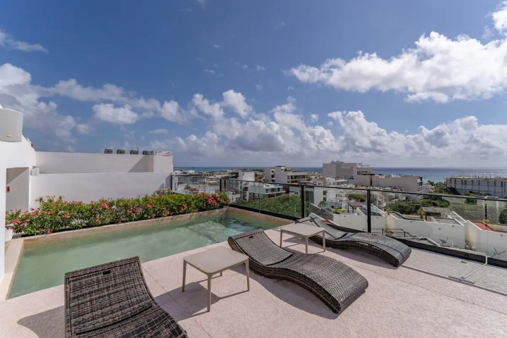 a close up of an umbrella on a cloudy day