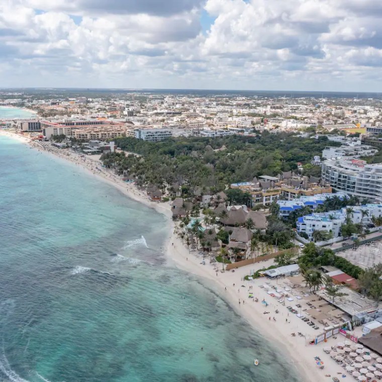 a view of a beach next to a body of water