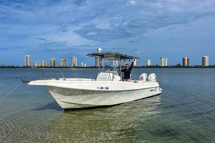 a small boat in a large body of water