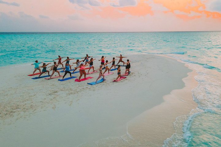 a group of people on a beach