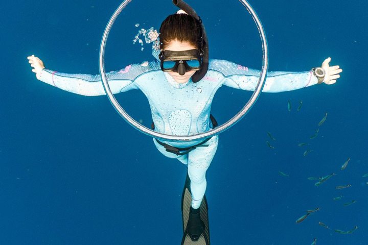 a person swimming in the water